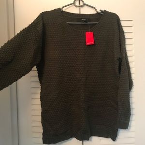 Green knitted sweater